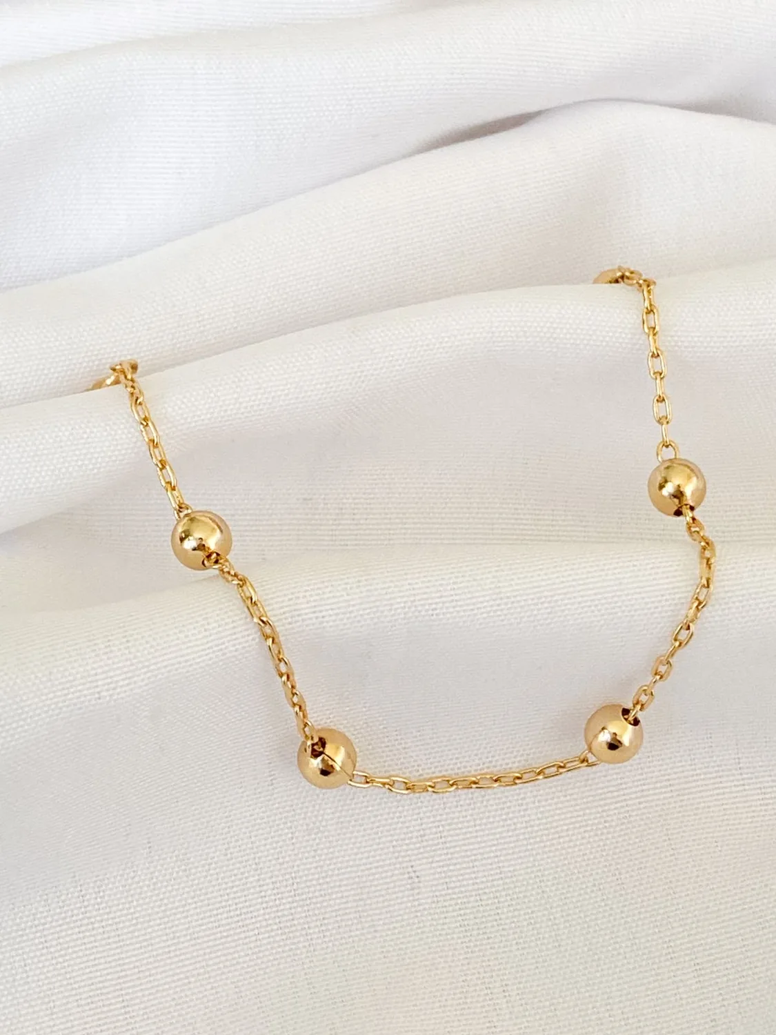 Pulseira dourada delicada